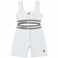 Conjunto Casablanca de mujer blanco de top y short sobre fondo blanco
